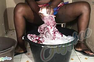 Housewife Does Weekend Laundry in Shaved Pussy