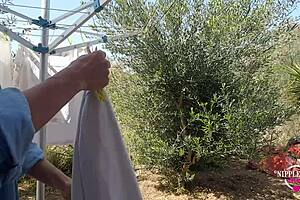 Kinky Mom Plays with Pierced Pussy Outdoors Hard