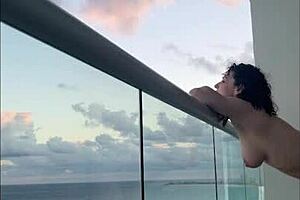 Mexican milf enjoys strap on love in Cancun