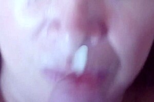 The wife gets large amounts in her mouth and face from the real cuckold husband