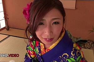 Ayumi Shinoda, a seductive Japanese MILF in kimono, pleasures with fingering, blowjob, and masturbation.