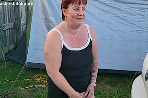 filthy kiwi mature milf pisses at campground... campers around