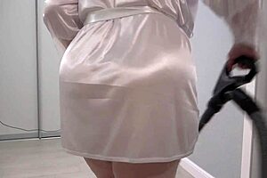 a home camera watches a mature housewife with a thick ass under a short robe and big boobs chubby milf behind the scenes pawg