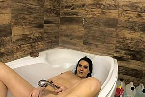 kinky milf plays games in bathtub with mega squirt at home