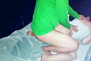 asian chubby pregnant mom relaxes at home with family