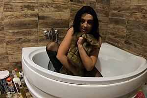 milfycalla doing pee play in bathtub with fur coat and pantyhose