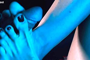 She passionately gives footjobs with her big natural tits.