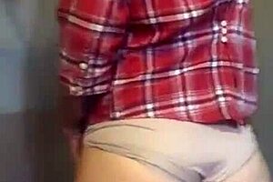 This sexy petite milf is teasing with her panties and plump ass.