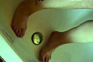 washing dirty feet in the bathtub, so relaxing