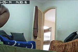 Hidden camera catches the maid cleaning naked at home.