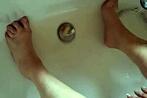 washing dirty feet in the bathtub, so relaxing