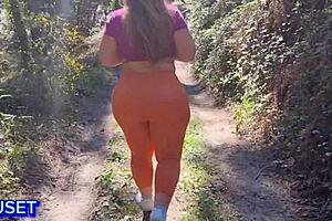 The curvy BBW stepmom with long hair shakes her ass outdoors with a stranger's monster cock