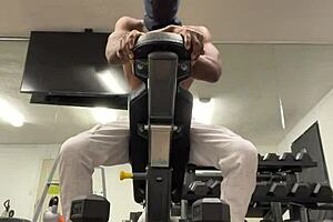 Muscular bodybuilder works biceps for lifting ladies in public California sex