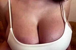 What is the stepmother with big milky tits doing with her teen stepdaughter? She masturbates and fucks.