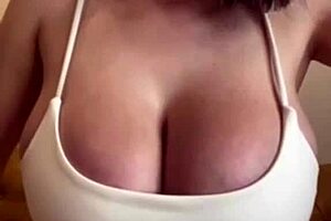 What is the stepmother with big milky tits doing with her teen stepdaughter? She masturbates and fucks.