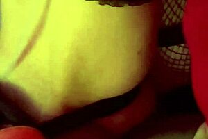 close-up self-exploration with dildo and toys in intimate setting