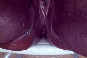 Black MILF shaves pussy on camera