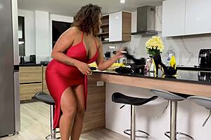 ebony milf maid caught in red dress by man and handled firmly