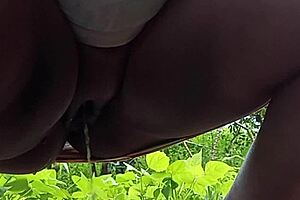 faithful married woman pees outdoors in public