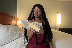 Eva Paker reads with her neighbor in roleplay.