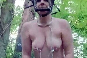 sexy ponygirl slave moans during bondage in forest