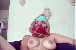 Real amateur Arab in hijab niqab masturbates to squirting orgasm on webcam while husband away.