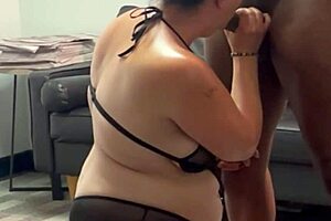 Hot white milf serves her sexy black boss at work.