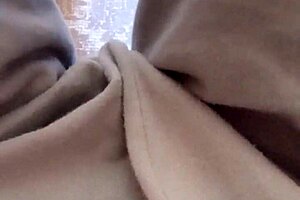 Does the amateur milf masturbate to orgasm in her bedroom pajamas?