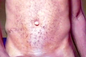 Lonely African man gropes himself after naked dance