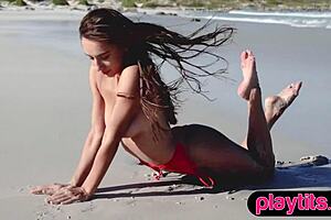 Asian milf strips at beach