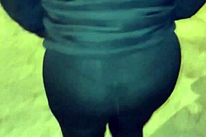 Look at this mature street whore flashing her thong in transparent leggings outdoors.