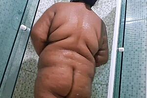 caught neighbor in the bath having a big squirt, her big tits on display