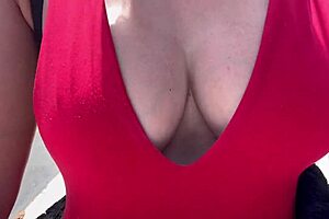 hot horny milf walks outdoor with big boobs on display