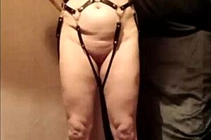 Slave girl in leather harness masturbates outdoors!