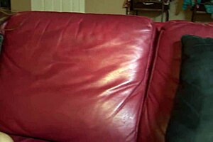 Horny busty milfs engage in lesbian muff diving on the sofa.