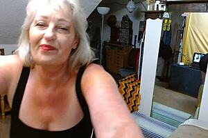 booty spreading short panty parade features only thongs and gstrings. mature teasing with natural tits and topless spreading.