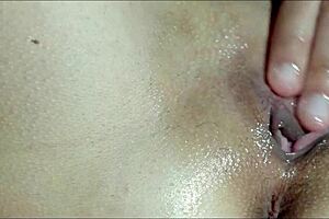he massages my pussy with oil until i cum close-up
