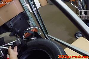 A milf in the office pawnshop subtly sucks cock before hidden sex.