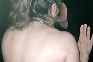 Slave milf at gloryhole receives facial