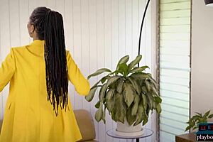 Hey, watch Kira Noir strip out of her business outfit 😍