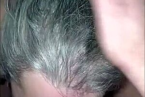 Slave milf at gloryhole receives facial