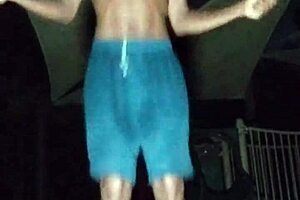 beautiful brunette works out in park with daddy