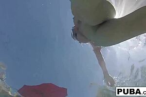 Pornstar Olivia enjoys a relaxing day at the pool, showing off her nude body with big tits, ass, and pussy in solo fun