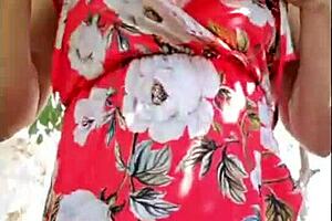 Hey, this hot blonde milf shows off her natural tits outside 😍