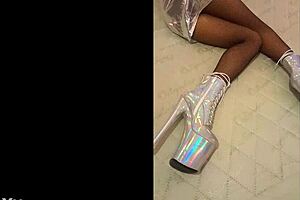 I love her in silver and fishnet pantyhose