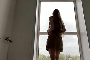 woman masturbates publicly by window to seduce passersby