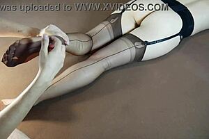 Horny MILF in stockings gets soles massaged until moaning with tickling fetish play. Feet worship builds to intense nylon-covered orgasm.