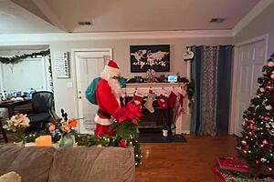 so this free christmas video shows santas little 18+ helper in a skirt with tattoos