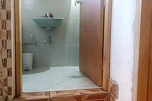 Colombian milf gets very horny and ends up masturbating at her neighbor's bathroom door