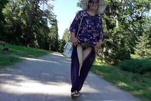 Hairy mature flashes in Aladdin pants at public park